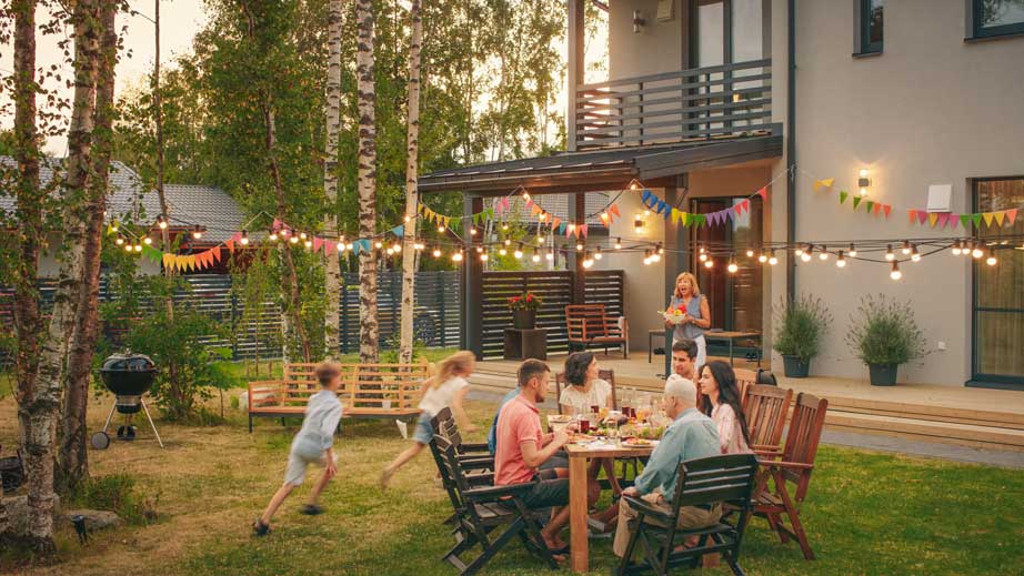 A family having a backyard barbecue